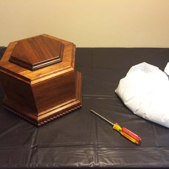 A Step-by-Step Guide on Placing Ashes into a Cremation Urn: A Seamless Process for Lasting Tribute
